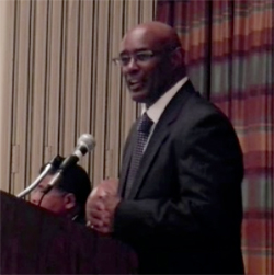 Photo of President Carl Jones giving state of the union.